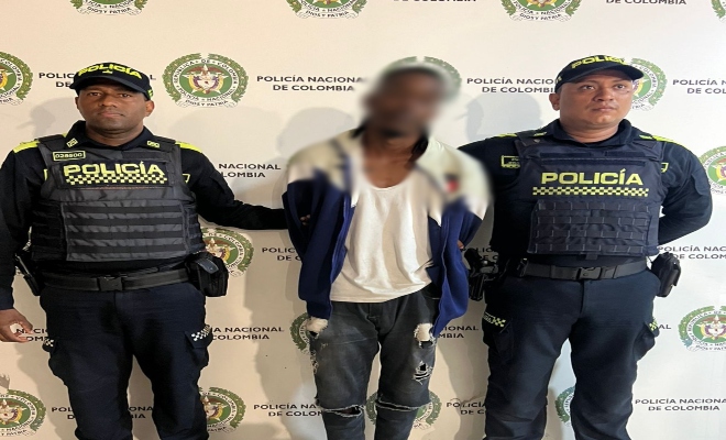 capturado con un arma de fuego