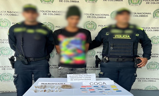 Dos policías y un sujeto capturado